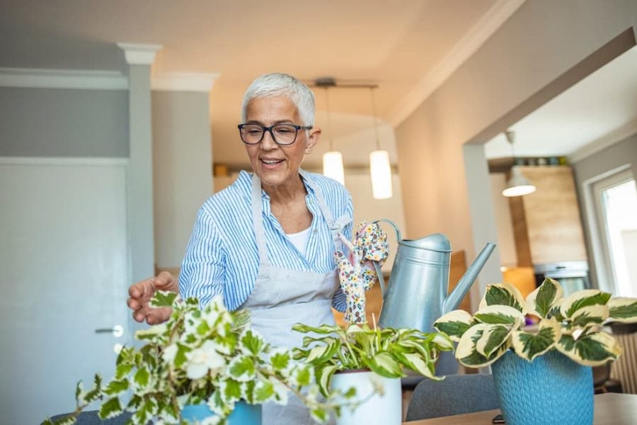 a resident enjoying her green living space
